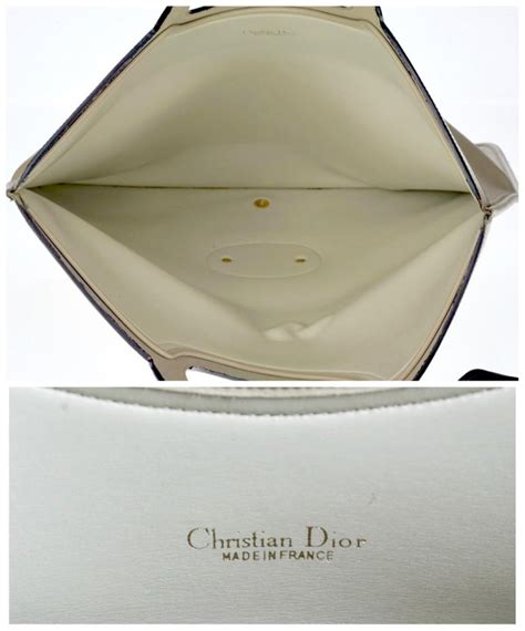 dior white clutch bag|christian Dior foldable clutch.